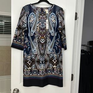 This is a beautiful dress. Mainly a navy blue, but the trim is black.